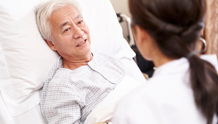 A patient talking to a doctor.