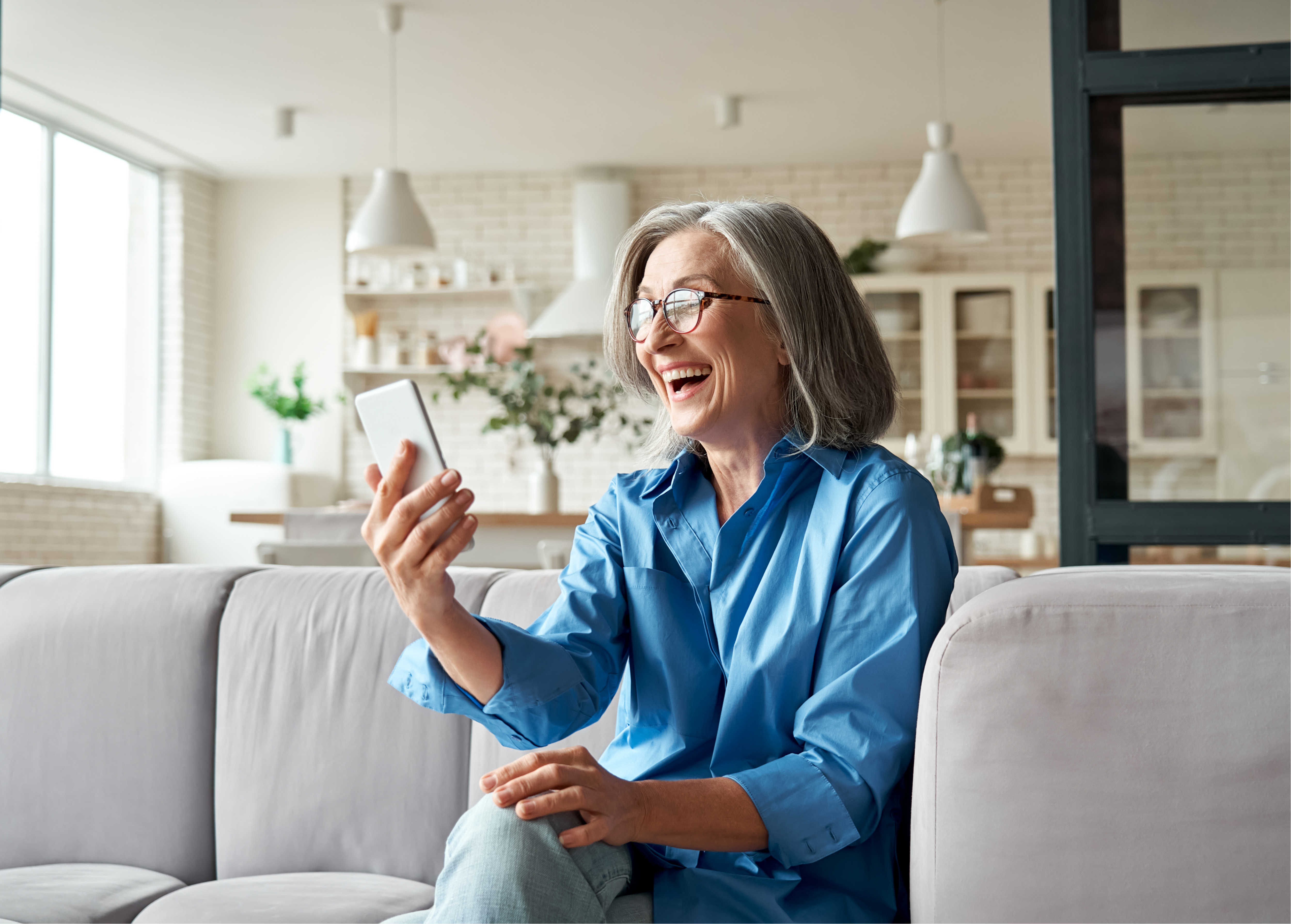 A woman receiving a digital gift on a smartphone