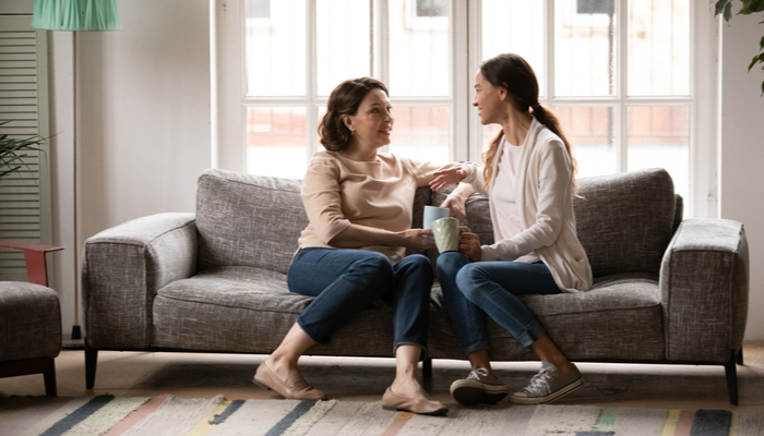 A mum talking to her adult daughter.