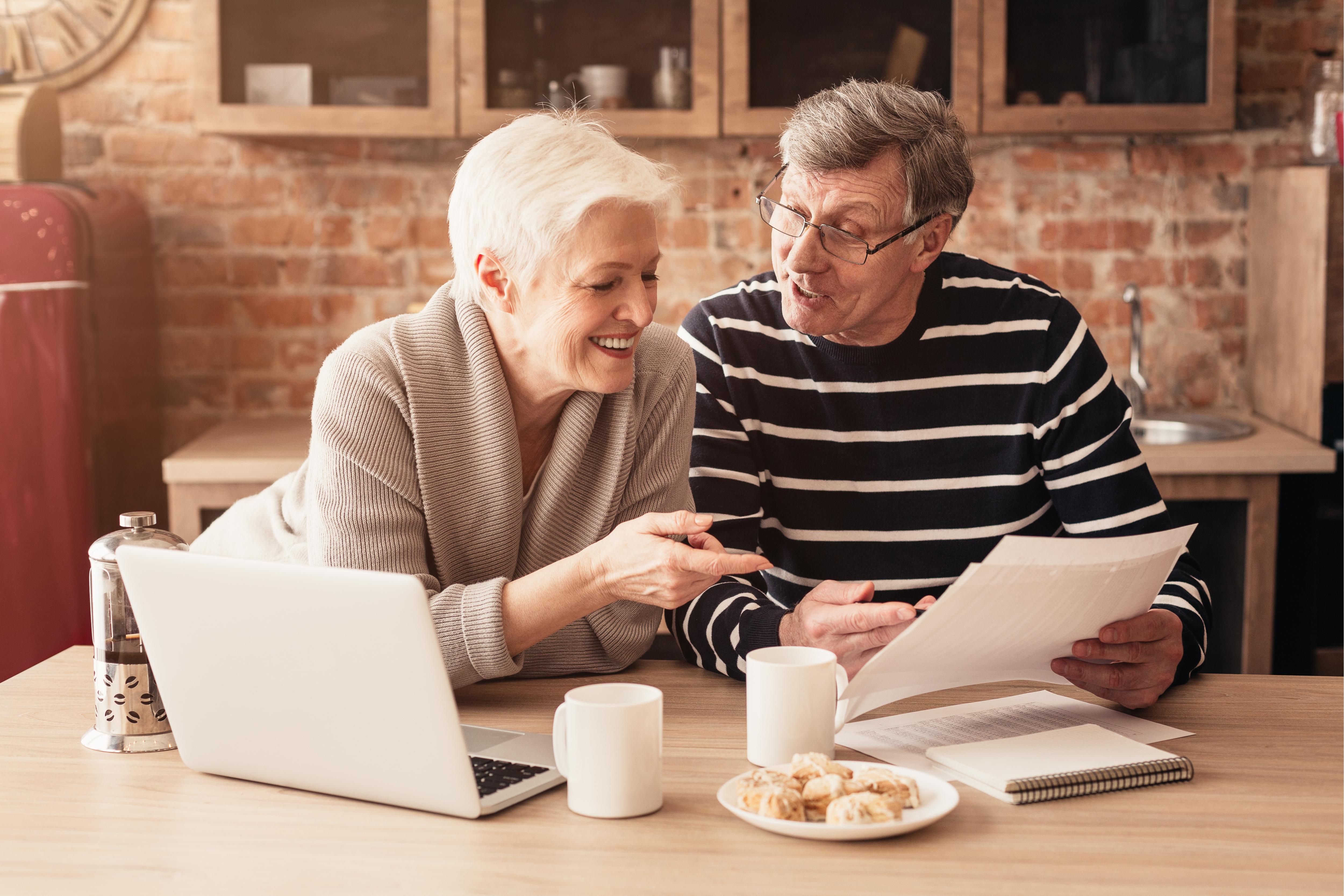 A couple reviewing paperwork.